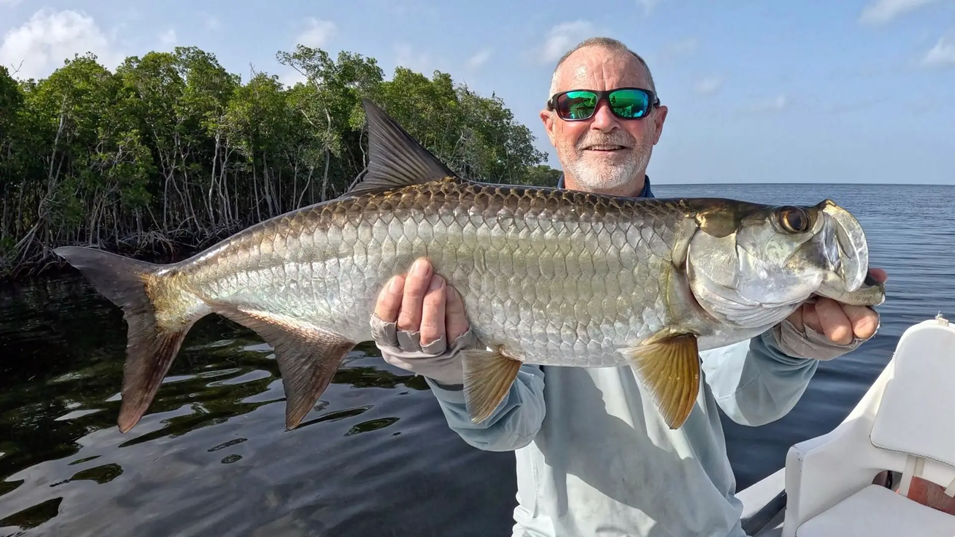 Pat with a Campeche Tarpon Use fly or light tackle for baby and juvenile tarpon with Tarpon Town Anglers in Campeche, Mexico.