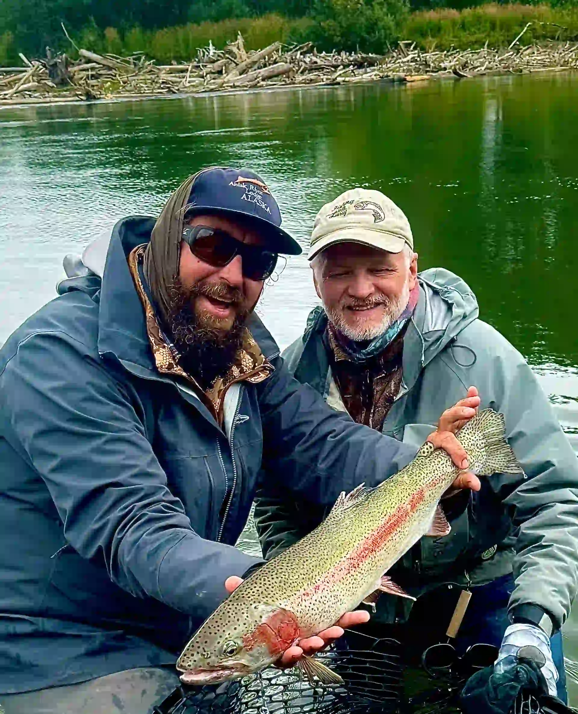 Guide and Guy Schoenborn Ben (Aniak River guide) and Host Guy Schoenborn with large rainbow trout during 2025 hosted week.