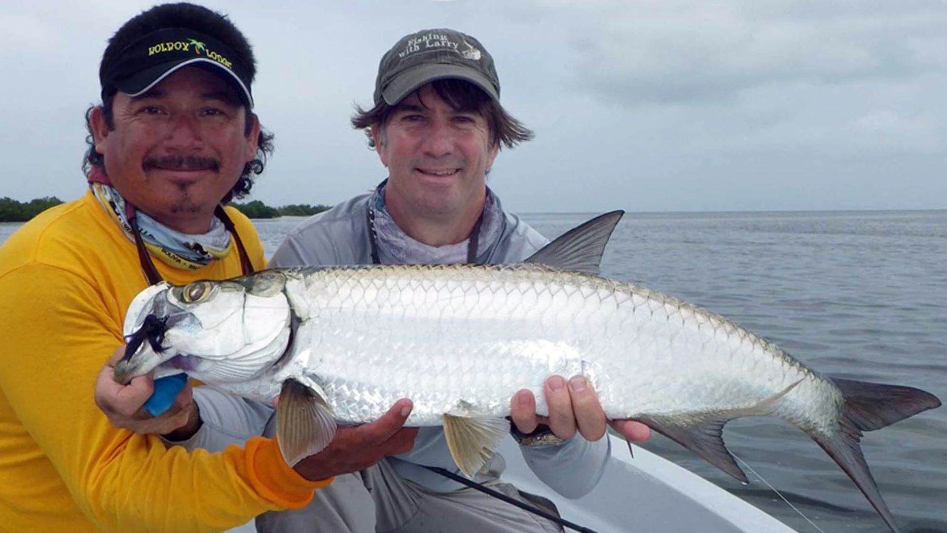 Brad Staples Brad Staples and guide with tarpon at Holbox Island, Mexico.