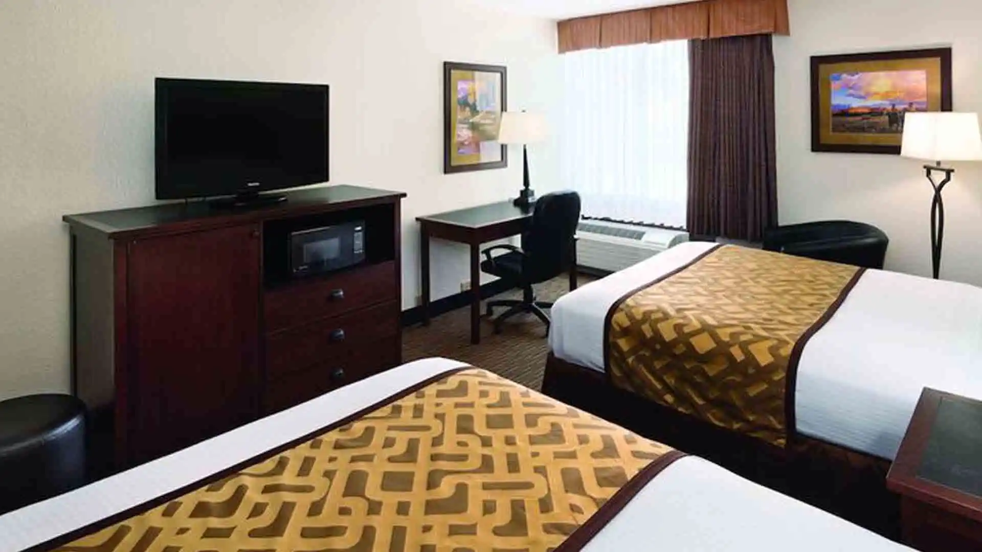 Standard Room with Two Queen Beds The Ramkota Hotel with American Flag